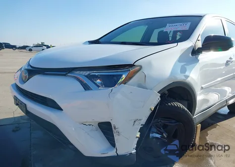 2017 Toyota Rav4 Le z USA, uszkodzony, nr VIN JTMZFREV8HJ716777